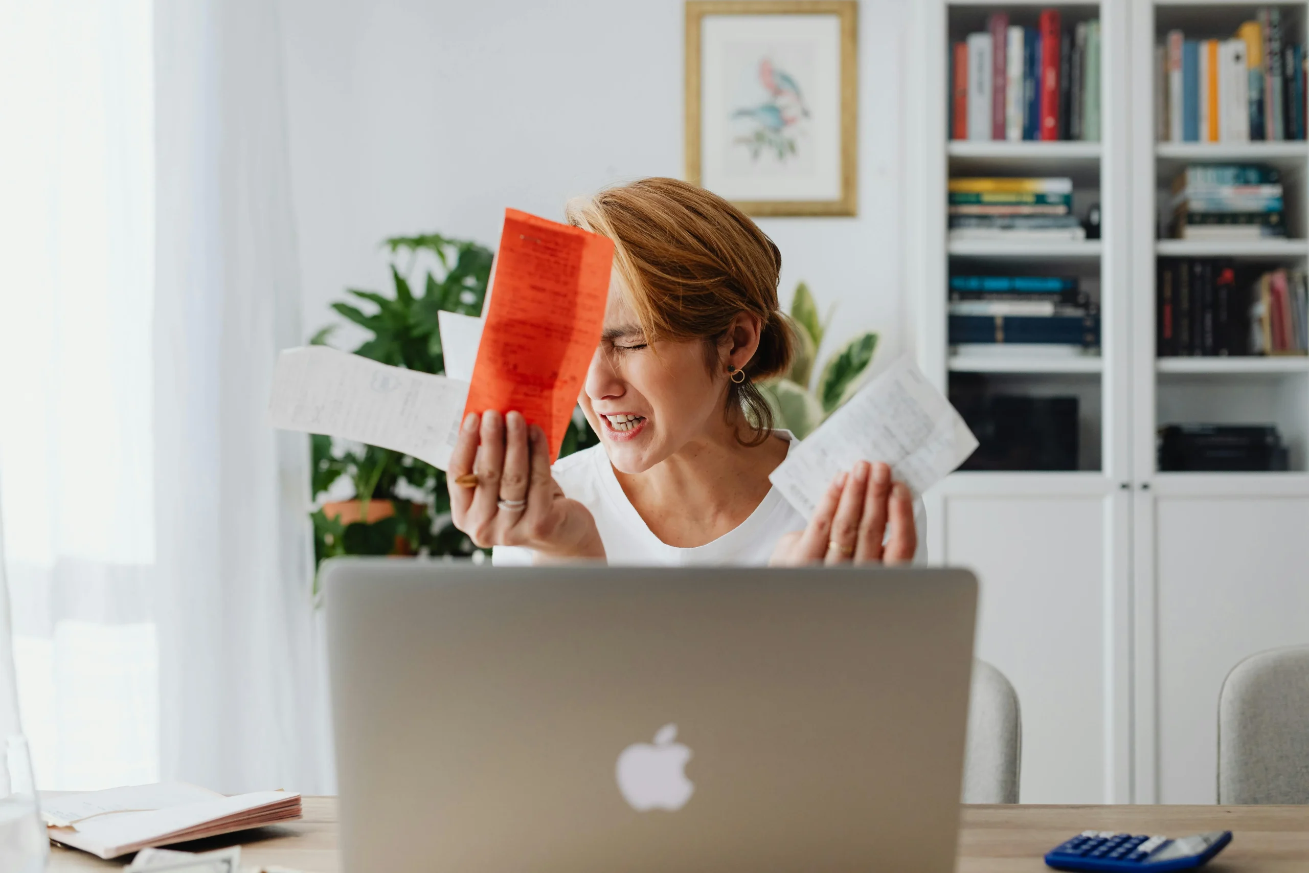 Frustrated short-term rental property manager dealing with expenses